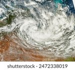 Tropical Cyclone Olga. Acquired January 27, 2010, this truecolor image shows Tropical Cyclone Olga over the Gulf of Carpentaria. Elements of this image furnished by NASA.