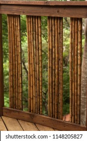 Tropical Deck Railing Constructed With Wood And Bamboo Rods