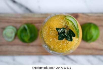 Tropical Drinks. Overhead Closeup View Of As Passion Fruit Daiquiri With Modern Presentation.