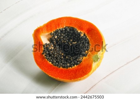 Tropical exotic sweet fruit - Papaya with seeds