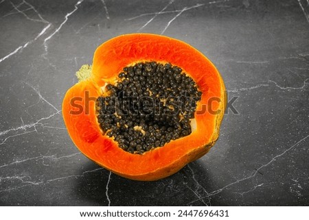 Tropical exotic sweet fruit - Papaya with seeds