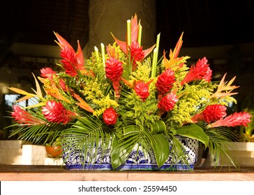 Tropical Flower Arrangement On A Ceramic Pot