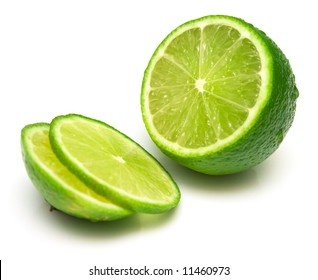 The tropical fruit known as lime, cut across. The image is isolated on white. Shallow DOF. Close-up. - Shutterstock ID 11460973