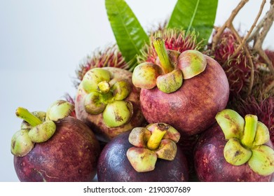 Tropical Fruit Mangosteen Reputed To Be The Queen Of The Market Juicy Asian Fruit On A White Background.