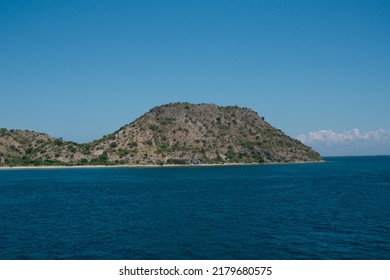 Tropical Green Hill Near Sea With Blue Sky