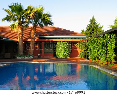 tropical house with swimming pool, little hotel