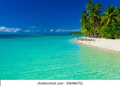 Tropical Island In Fiji With Sandy Beach And Clear Lagoon