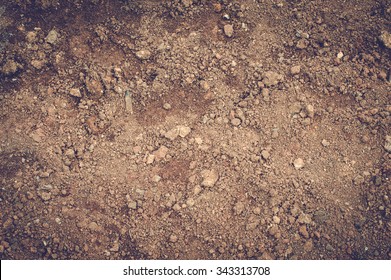 Tropical laterite soil or red earth background. Red mars seamless sand background. Top view  - Shutterstock ID 343313708