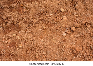 Tropical laterite soil or red earth background. Red mars seamless sand background. Top view  - Shutterstock ID 345634742