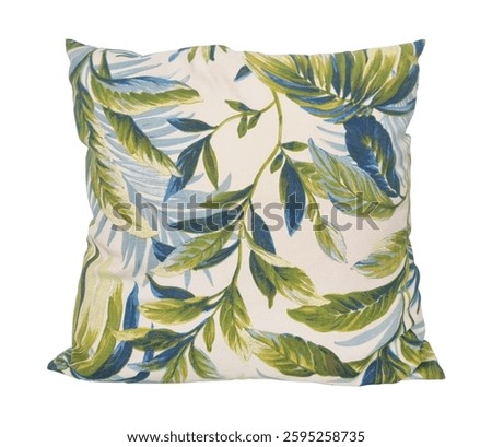 tropical leaf pattern throw pillow isolated on background with clipping path. Green and blue botanical design cushion, square decorative pillow case. Jacquard fabric texture, home decor equipment.