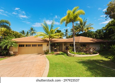 Tropical Luxury Home, Exterior View With Green Lawn And Driveway