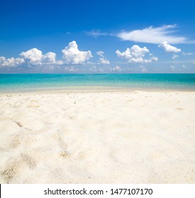 Tropical Maldives Island With White Sandy Beach And Sea