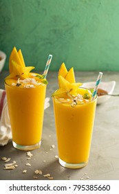Tropical mango smoothie with honey and coconut