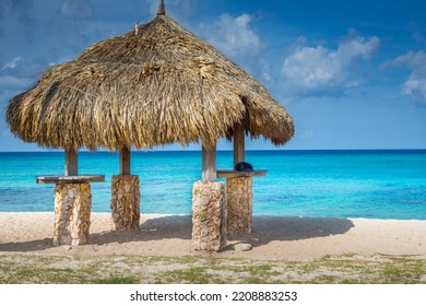 Tropical Paradise, Aruba Idyllic Caribbean Beach At Sunny Day With Rustic Palapa, Dutch Antilles, Caribbean Sea