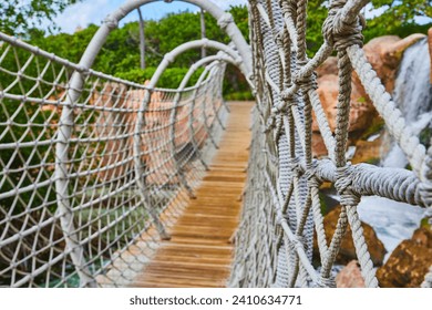 Tropical Rope Bridge Adventure in Lush Forest - Eye-Level Perspective - Powered by Shutterstock