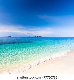 Tropical Sandy Beach Malcapuya At Summer Sunny Day