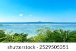 Tropical sea and Ie Island visible across the ocean, Okinawa Prefecture