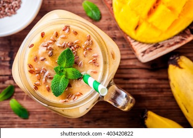 Tropical Smoothie Made With Mango, Banana, Flaxseed And Mint