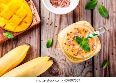 Tropical Smoothie Made With Mango, Banana, Flaxseed And Mint