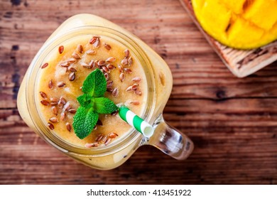 Tropical Smoothie Made With Mango, Banana, Flaxseed And Mint