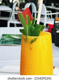 Tropical Smoothie With Mint, Mango, Banana, Pineapple Fruit Drink, Healthy Food Concept