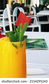 Tropical Smoothie With Mint, Mango, Banana, Pineapple Fruit Drink, Healthy Food Concept