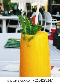 Tropical Smoothie With Mint, Mango, Banana, Pineapple Fruit Drink, Healthy Food Concept