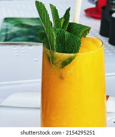 Tropical Smoothie With Mint, Mango, Banana, Pineapple Fruit Drink, Healthy Food Concept