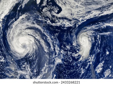 Tropical Storm Leslie 12L and Hurricane Michael 13L in the Atlantic Ocean. Tropical Storm Leslie 12L and Hurricane Michael 13L in. Elements of this image furnished by NASA. - Powered by Shutterstock