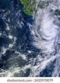 Tropical Storm Raymond 17E off Mexico. Tropical Storm Raymond 17E off Mexico. Elements of this image furnished by NASA.