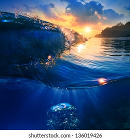 Tropical Sunset Design Template Splitted By Waterline. Beautiful Colorful Ocean Surfing Wave Raising With Drops And Splashes