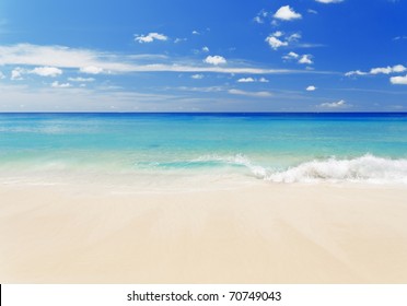 Tropical White Sand Beach And Blue Sky.