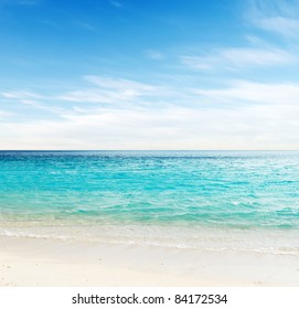 Tropical White Sand Beach And Blue Sky.