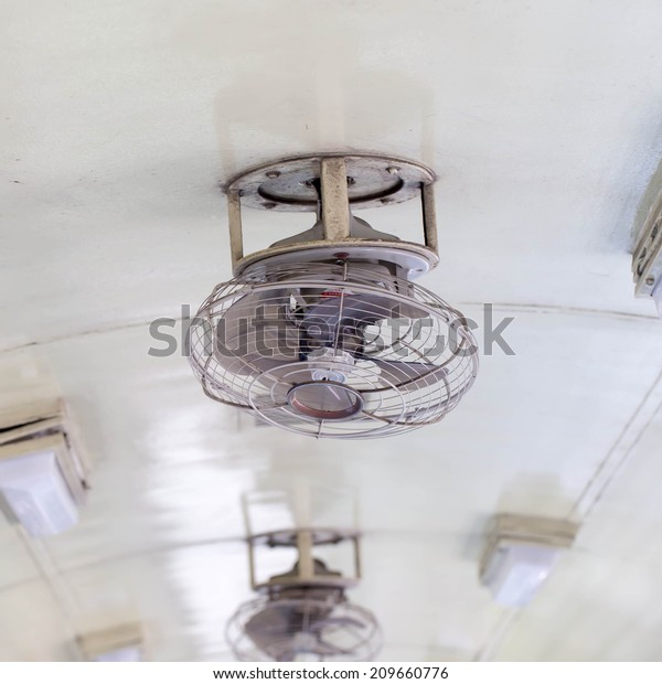 Tropical Wooden Colonial Style Ceiling Fan Stock Image