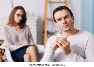 Troubled handsome man thinking about his problems - Shutterstock ID 526087216