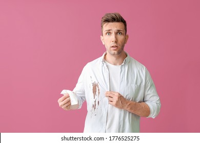 Troubled Man In Dirty Clothes And With Napkin On Color Background