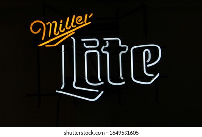 Troup TX, December 5, 2018: Neon Miller Lite Sign on Beer Store advertising Beer For Sale