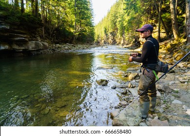 Trout Fishing In The Mountain River