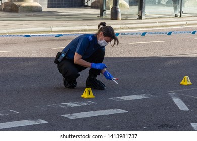 Trowbridge Wiltshire May 12th 2019 A Wiltshire Police Forensics Officer Collects Evidence From A Crime Scene