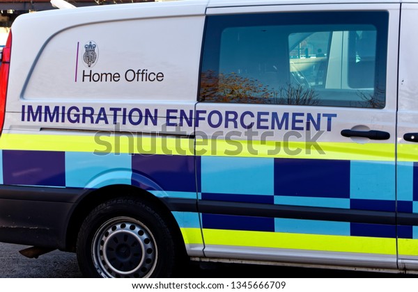 Trowbridge, Wiltshire,\
UK - November 29 2016: A Home Office Immigration Enforcement Van\
parked in a street