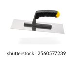 Trowel with black-yellow handle to the smoothing of plaster isolated on white background.