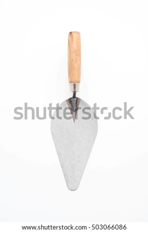 Trowel the mortar on white background