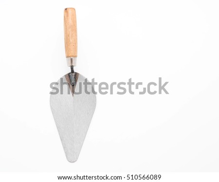 Trowel the mortar on white background