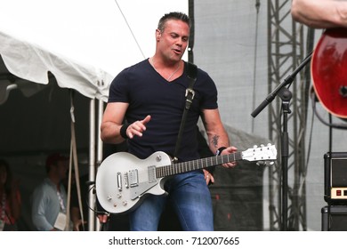 Troy Gentry Of Montgomery Gentry Performs Onstage During The ACM Party For A Cause Festival At Globe Life Park In Arlington On April 17, 2015 In Arlington, Texas.