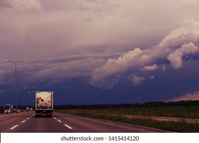 Truck Carrying Portable Fuel Tank Racing To Run Away From The Storm