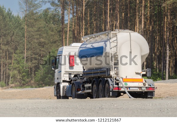 TRUCK CISTERN - A vehicle with delivery of\
building materials\
