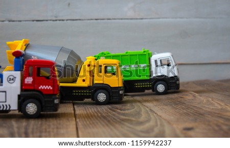 a truck concrete mixer and tow truck