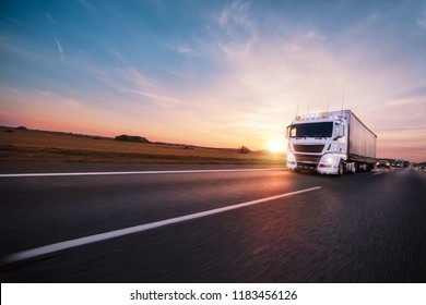 Truck with container on highway, cargo transportation concept.