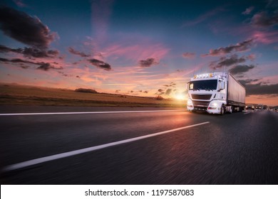 Truck with container on highway, cargo transportation concept. Shaving effect.