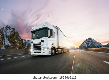 Truck with container on highway, cargo transportation concept. Shaving effect. - Shutterstock ID 1923463118